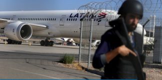 Asalto en Aeropuerto Internacional de Santiago de Chile deja dos muertos y autos incendiados